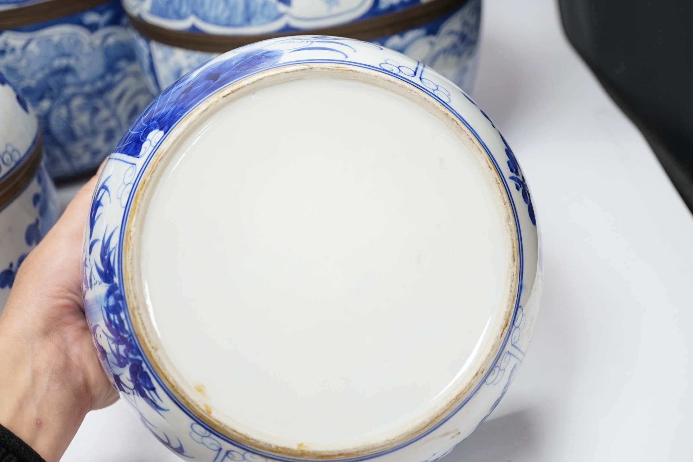 Two pairs of Japanese Arita blue and white bowls and covers, largest 27cm